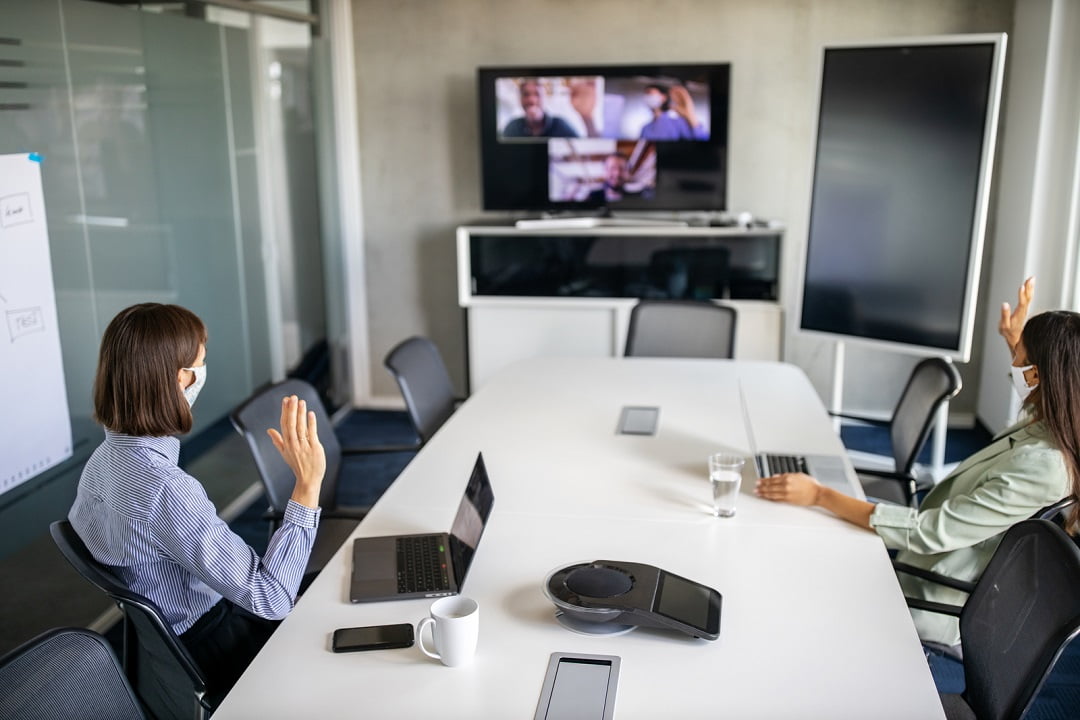 Business team having a meeting over internet during pandemic